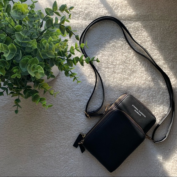 Handbags - Black faux leather cross strap wallet